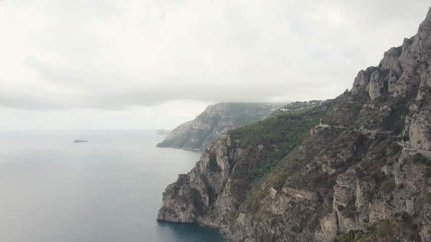 Drone over Amalfi Coast. Beautiful coastline, cliffs, green trees and Mediterranean sea. Video shot in 4K with a DJI Mavic Pro. 4