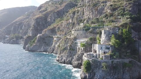 Drone over Amalfi Coast. Beautiful coastline, cliffs, green trees and Mediterranean sea. Video shot in 4K with a DJI Mavic Pro. 2