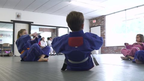 Children warming up for Jiu-jitsu class