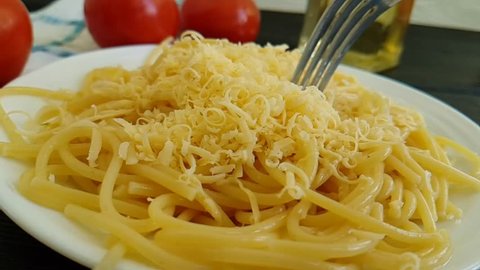 spaghetti plate cheese fork, slow-motion