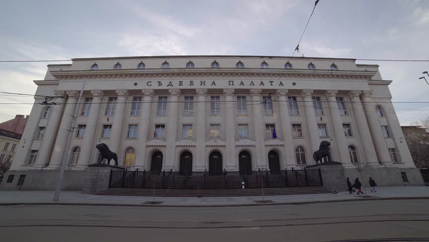 Court Of Justice Building in Sofia, Bulgaria. In the top of the building cyrillic letters translate the words "palace of justice"