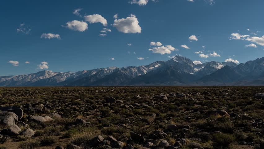 Time Lapse Clouds Over desert Mountains 