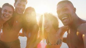 Group Of Friends Posing For Selfie Together On Beach Vacation - Powered by Shutterstock - Get 15% off with code: PIKWIZARD15