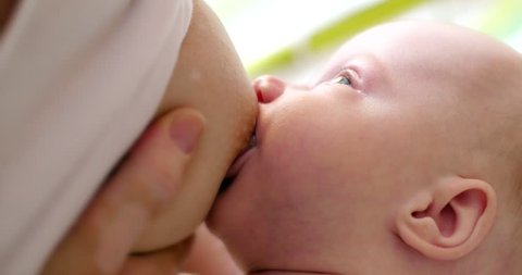 4K - Child breastfeeding