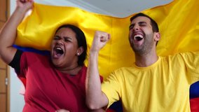 Colombian Friends Celebrating with National Flag - Powered by Shutterstock - Get 15% off with code: PIKWIZARD15
