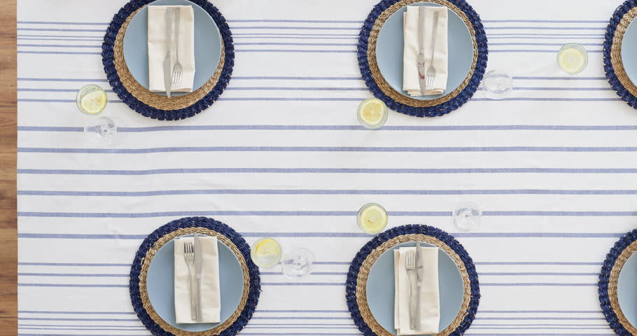 top view group of multi ethnic friends preparing table enjoying delicious mediterranean lunch eating pizza vibrant happy reunion meal time lapse tracking