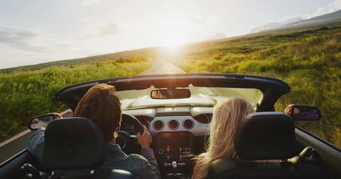 Couple Driving Into Sunset Convertible Stock Footage Video (100% ...