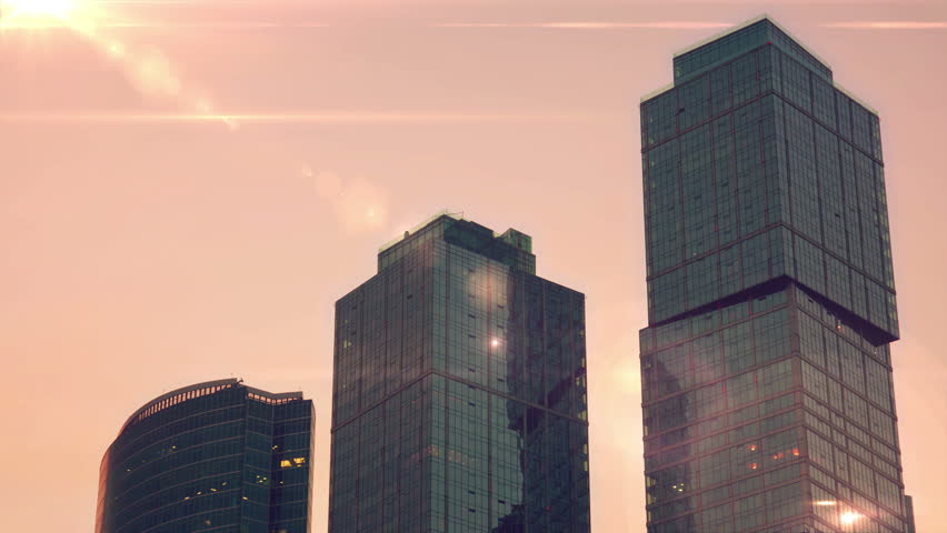 The Tops of Skyscrapers On Stock Footage Video (100% Royalty-free : An astonishing picture depicting a gorgeous view. Its tones are vibrant and combination ideally. The arrangement looks fantastic, and the particulars are also extremely clear.