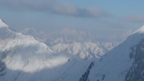 High snow capped mountains in majestic view of Kyrgyzstan