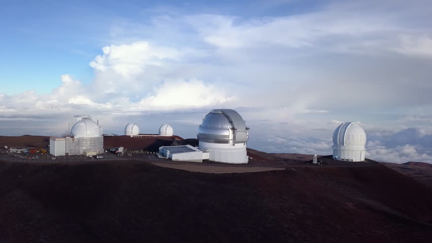 Aerial view Sunrise over the summit of Mauna Kea Observatory, Hawaii. USA