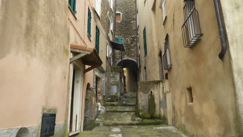 A narrow deserted pedestrian street in the old town of Perinaldo, Imperia province, Liguria region, Italy Royalty-Free Stock Footage #1010053241