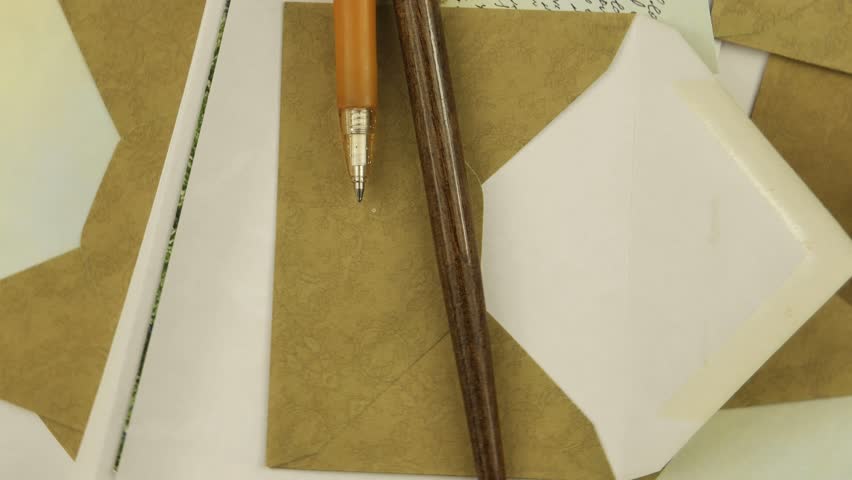 Rotating composition of the various type of the envelopes and pens, background 