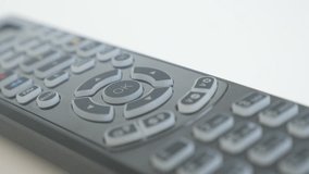 Modern universal remote control close-up 4K panning footage