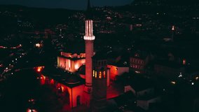 Aerial footage of the Sarajevo, capital of Bosnia and Herzegovina. Video made during golden hour. In the shift of day and night.
