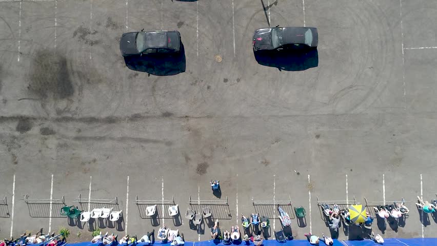 Aerial view of drifting car, slow motion video
