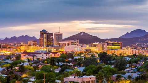 Tucson, Arizona, USA downtown skyline with Sentinel Peak from day to night.