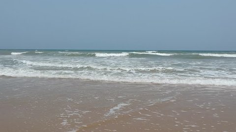 Low Angle View of Beautiful Nature Beach/Ocean Landscape with fresh air and  great waves, suitable for Movie Intro or Background. Paradise Beach in Pondicherry/Puducherry.