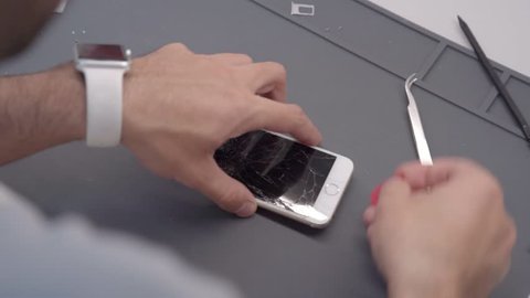Close-up video showing process of mobile phone repair