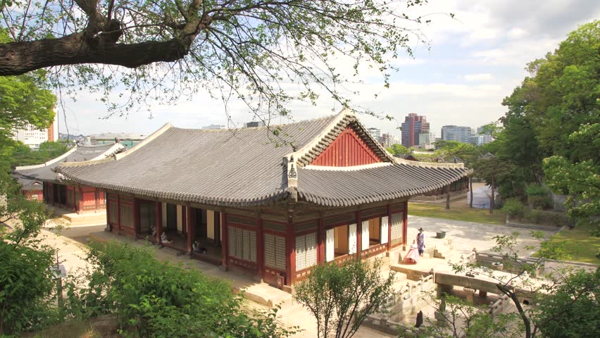 A couple with korean trandional costume 
 walking in Changdeokgung  palace.