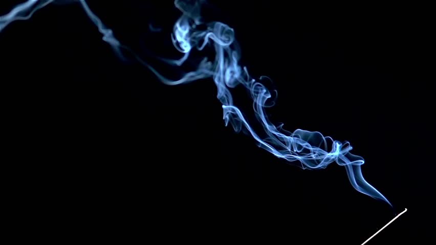 Incense stick are burning and smoke on black background,Smoke from incense. Slow motion | Shutterstock HD Video #1010137544