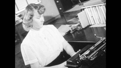 1940s: Woman types on typewriter, woman operates switchboard, man talks on phone, man types on stenotype, woman takes papers out of filing cabinet, man puts folder into briefcase, closes briefcase.