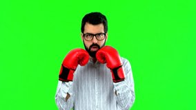 Man with boxing gloves on green screen chroma key - Powered by Shutterstock - Get 15% off with code: PIKWIZARD15