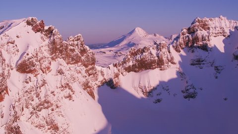 Oregon circa-2018.  Aerial view of North and South Sister Mountains from Broken Top Mountain. Shot from helicopter with Cineflex gimbal and RED Epic-W camera.