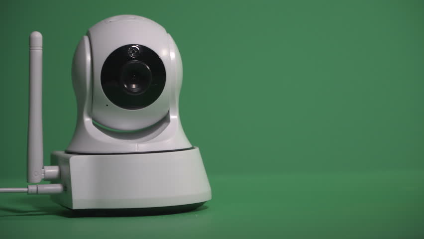Security camera. The security camera turns the camera in different directions