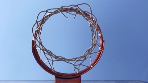 Basketball going through the basket,slow motion : Vojvodina, Serbia April 23 2018