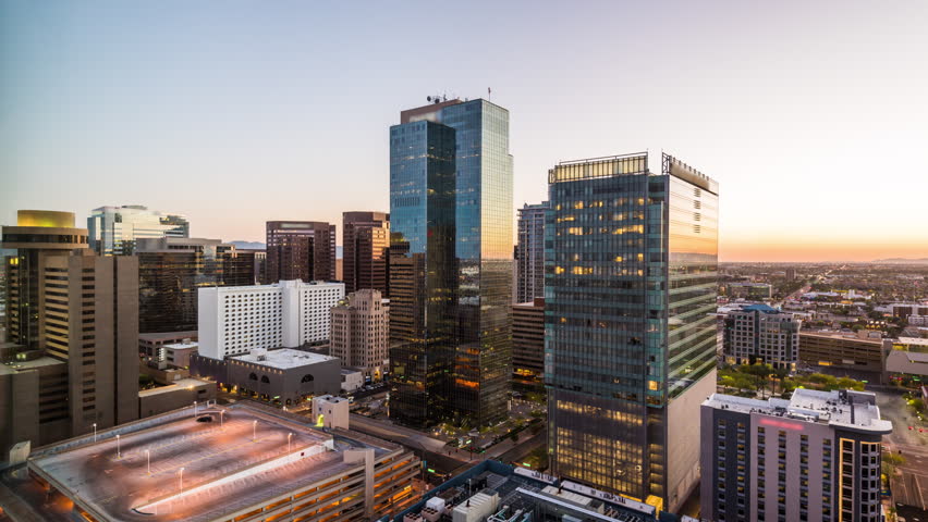 Phoenix, Arizona, USA downtown cityscape time lapse from dusk to night.