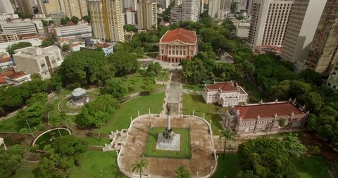 High aerial of The Peace Theatre, Teatro da Paz and its grounds in Belem do Para, Amazon, Brazil surrounded by modern high-rise buildings