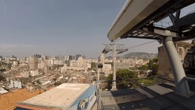 Cable cars entering and exiting station at the top of the Providencia favela in Rio de Janeiro, Brazil - Powered by Shutterstock - Get 15% off with code: PIKWIZARD15