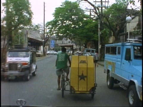 THE PHILIPPINES, 1998, Manila, POV behind pedal cart