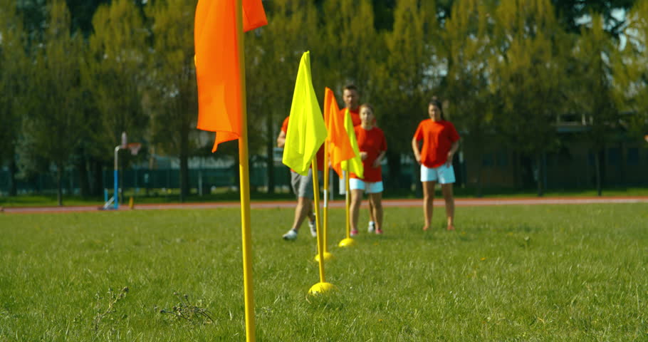 slow motion shot of footballers training