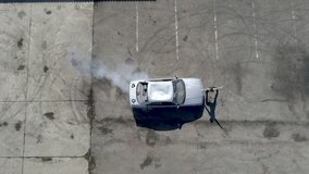 Aerial view of drifting car, slow motion video