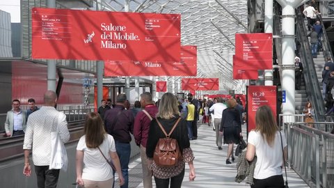 Milan, Italy - April 17 , 2018: Visitors walk in the pathway at the Salone Internazionale del Mobile - Furniture trade fair in Rho-Fiera Milano, the largest trade fair in the world of this kind