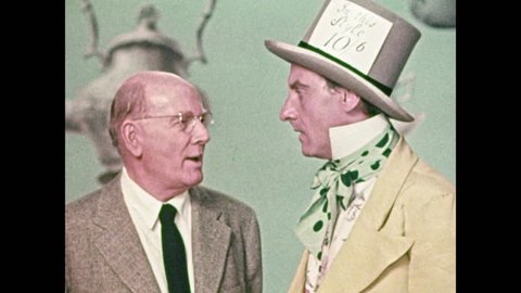 1950s: Professor smiles, talks to Mad Hatter who looks shocked. Man in cowboy hat stands up, shakes Professor's hand, waves, leaves. Professor talks, smiles, Mad Hatter looks frustrated.
