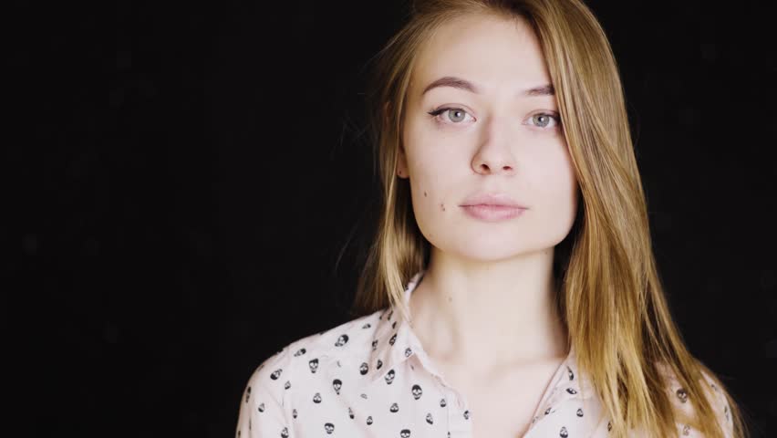 Girl against pills and medicine. A woman holds a pill in her hands and protests. 4k