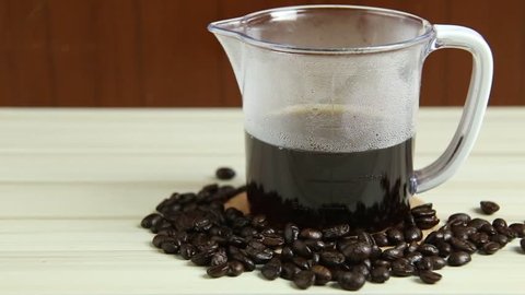 The coffee drip cup on white table  for background footage camera movement.