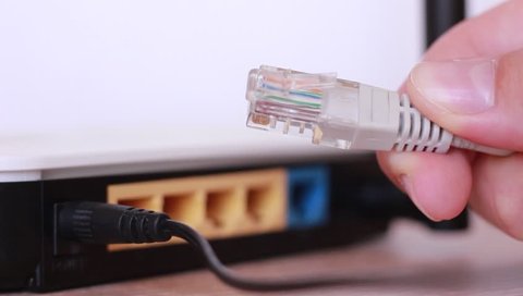 Internet cable in front of Wi Fi router