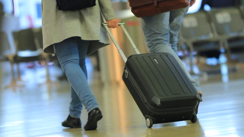 Person Carrying Luggage At Airport. Stock Footage Video (100% Royalty ...