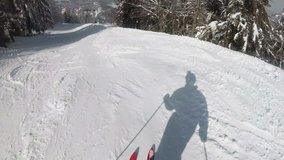 4K. Mountain skiing in sunny day.Skier,skis,POV clip