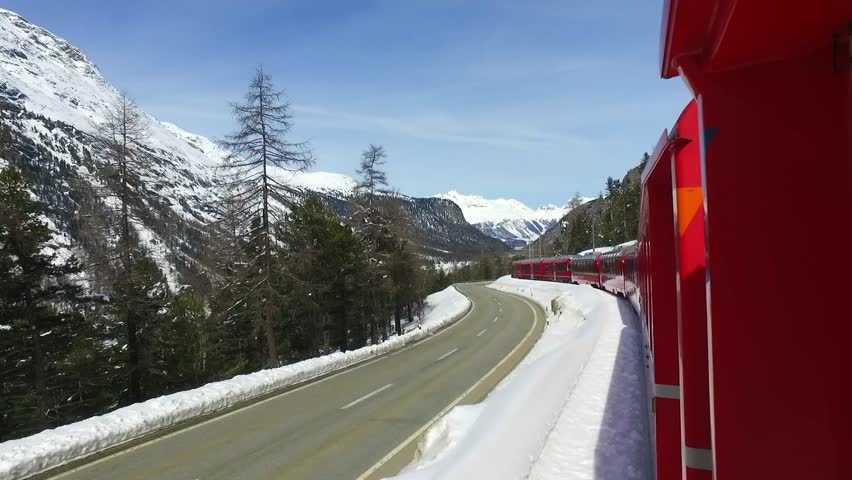 Bernina Express, train on the railway and bus on the road. From Tirano to Sankt Moritz