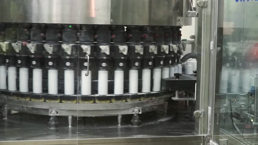 Factory for the production of medicines, glass bottles on the conveyor. Clip. For the production of plastic bottles and bottles on a conveyor belt factory