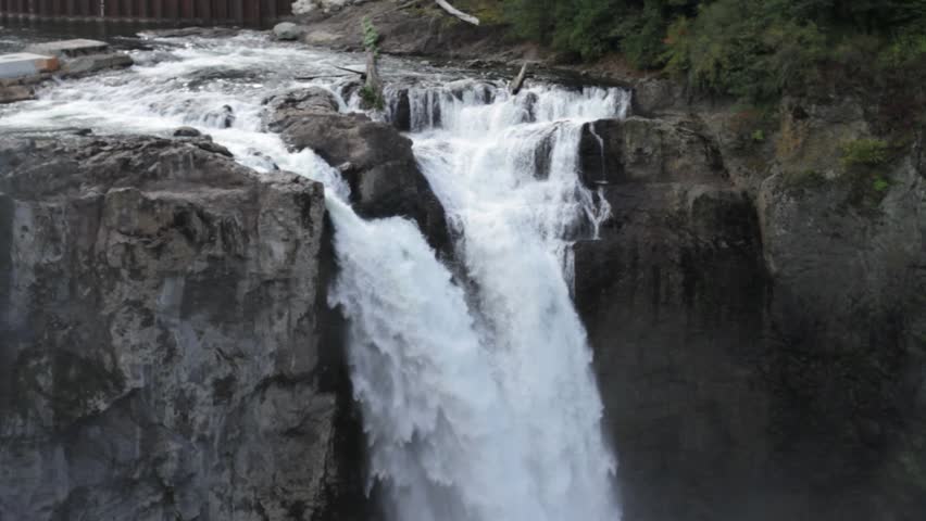 Tilt shot of Snoqualmie falls in the Cascade Mountains