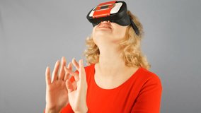 Attractive young woman in virtual glasses or VR headset, smile happy woman