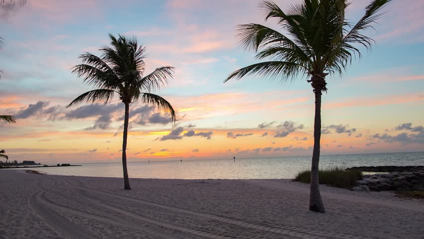 Sunrise on the Smathers beach - Key West, Florida. Raw video source.