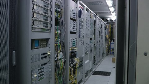 Inside telecom server room, panorama.