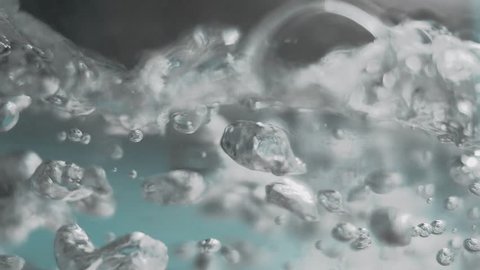 Crystal clear water brought to a boil. Slow motion shot. Food video