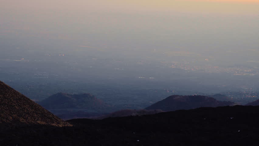 Hazy City below Mount Etna